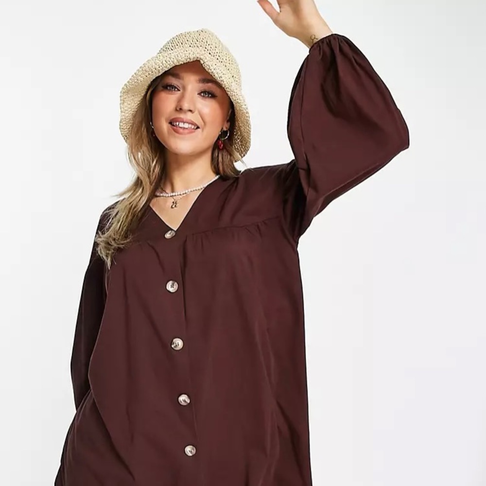 Chocolate Brown button through mini smock dress with long sleeves.